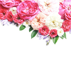 Obraz na płótnie Canvas Flowers composition. Frame made of rose flowers on white background.