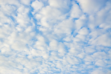 Mostly white cloud against blue sky nature background evening scene