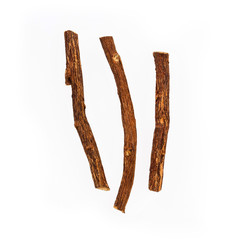 Close up of Ayurvedic herb Liquorice root,Licorice root, Mulethi or Glycyrrhiza glabra root on a wooden surface is very much beneficial for Soothes your stomach,poisoning