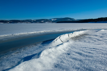 Frozen lake and surroundings