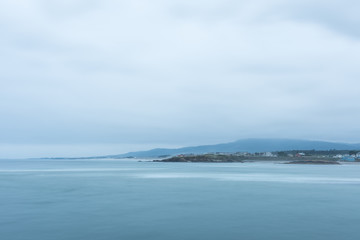 Long exposure photo of a lighthouse on the Spanish coast