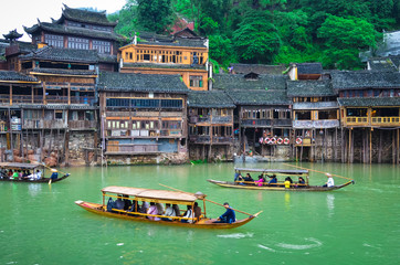 Phoenix Ancient City, Hunan, China. Rivers and boats in the ancient city of Phoenix, stilts in the ancient city of Phoenix. Fenghuang Ancient City