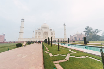 Taj Mahal Scenic view with foggy weather. A UNESCO World heritage site at Agra, India.