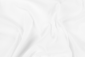 Obraz premium Abstract white fabric texture background. Cloth soft wave. Creases of satin, silk, and cotton. 