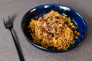 plant-based recipes, sticky ginger noodles with garlic vegan mince and sesame seeds