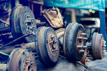 Old wheel hub car system Car parts in old warehouses. Used vehicle part for recycling