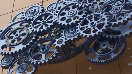 Mechanism cobalt blue gears and cogs at work on orange background. Industrial machinery. 3D illustration. 3D high quality rendering.