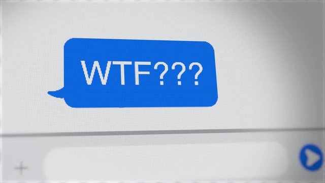 WTF text message written on screen of mobile phone chat