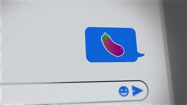 Eggplant Emoji On Screen Of Mobile Phone Or Computer Chat Conversation