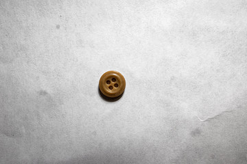 button on the white wall