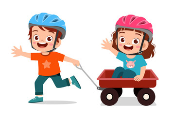 happy cute little kid boy and girl play toy wagon