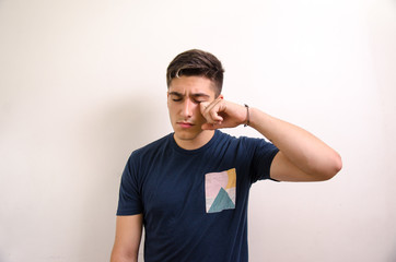 Young man almost crying