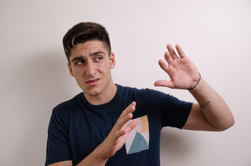 Young man with rejection attitude