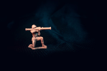 Tan plastic army man with Bazooka