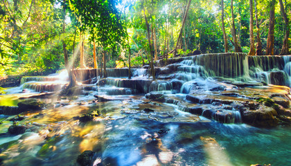 Beautiful waterfall in deep forest of Thailand, Breathtaking view of Huay Mea Kamin waterfall,...