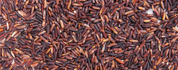Black rice as background, healthy gluten free food concept