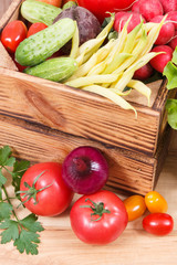 Healthy vegetables in wooden box. Source vitamins and minerals