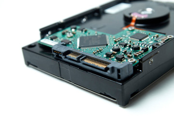 Opened hard drive from the computer hdd disk drive with mirror effects. Disassembled hard drive...