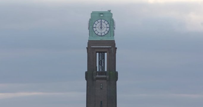 Hounslow, UK - January 10 2020: The clock tower of the Gillette Building in Hounslow on a cloudy day