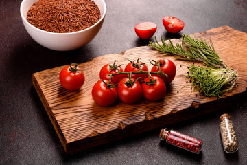 Ingredients for Indian cuisine are on a black surface