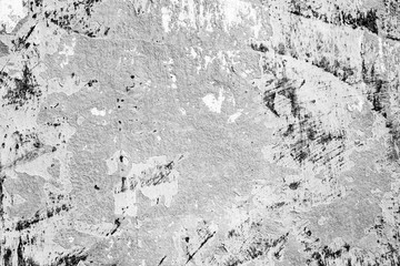 Texture of a concrete wall with cracks and scratches which can be used as a background