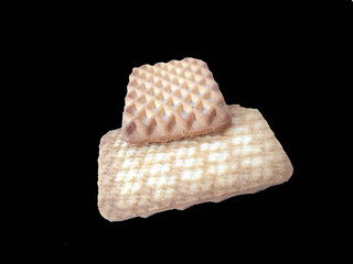 fresh tasty biscuit isolated on black background