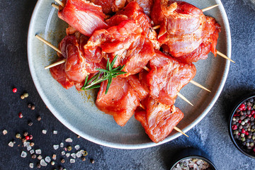 raw meat skewers pork marinade (healthy food) menu concept background. top view. copy spaces