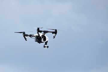 Russia, Ramenskoye July 2019. Unmanned quadrocopter with a digital camera on a cloudy sky background