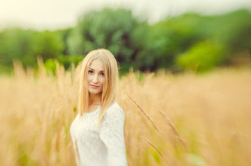 Fototapeta na wymiar Beautiful sexy blonde outdoors portrait