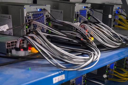 working server. Internet wires and flashing lights on the server