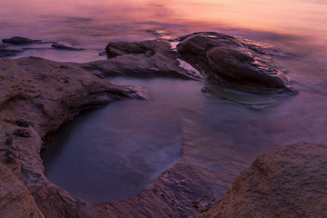 Obraz premium Mystery colourful sea with rocks befor sunrise near Ravda sity, bulgaria Black sea coast. 