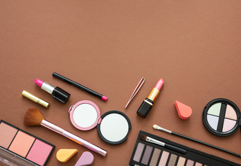 Make up cosmetics products against brown color background