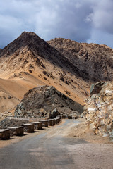 Road in Himalayas with mountains