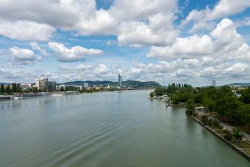 Fototapeta na wymiar Beautiful view of Danube river from bridge in Vienna, Austria, summer day