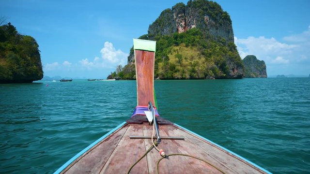 Wooden bow Ancient wooden boat Sea of ​​Ko Rok indigo water dark blue beautiful Krabi Thailand Asia