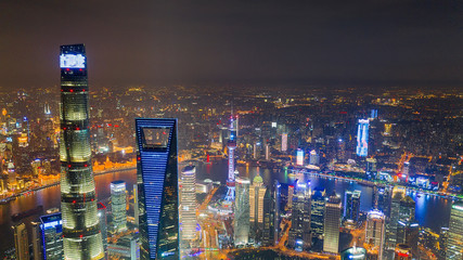 erial view of Shanghai towers and tall buildings lighted up at night
