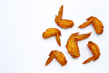 Fried chicken wings on white background.