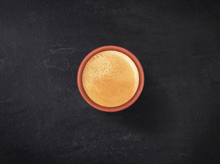 Tandoori tea served in a clay pot, close-up