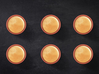 Tandoori tea served in a clay pot, close-up