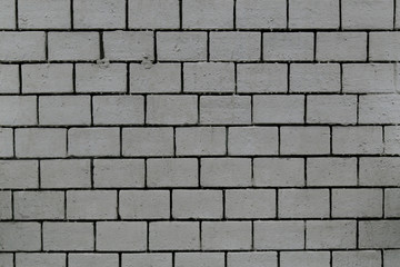 gray rough painted brick wall abstract background