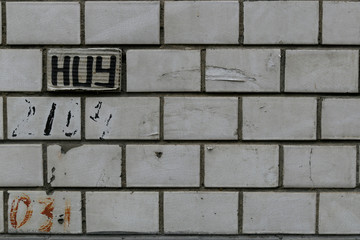 Fototapeta na wymiar old rough gray brick wall