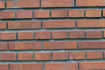 Obraz premium red rough brick wall abstract background