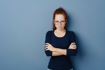 Pugnacious young woman glaring at the camera