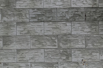 gray rough brick wall abstract background