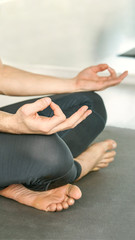 Yoga calm pose. Lotus asana studio training. Man seated at mat. Beginner class