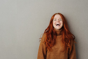 Laughing young woman with vivacious smile