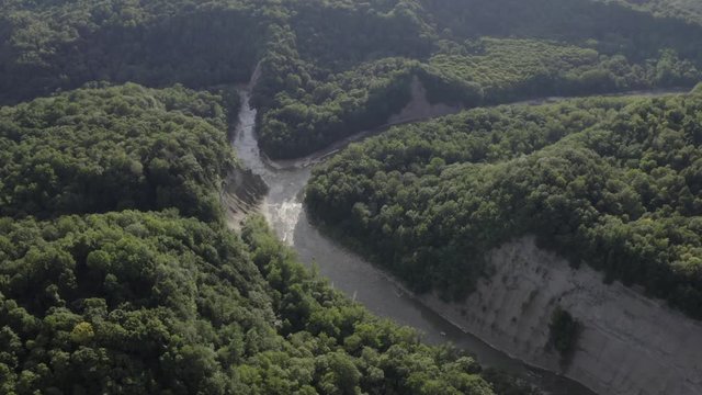 Drone footage of Zoar Valley, New York. This is one clip of many in this series - each of which shows a different angle of the valley and slightly different contents (rivers / mountains) in the frame.