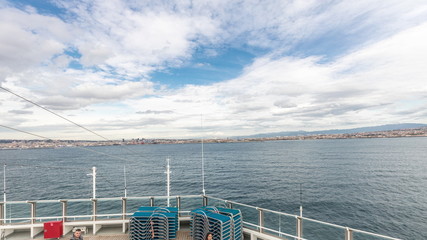 Aerial view of sea with wawes and port from ship sailing in the open sea timelapse
