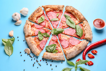 Tasty pizza on color background