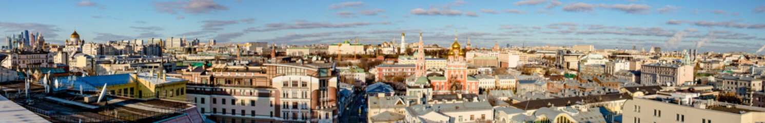 Fototapeta na wymiar Panoramic view of the center of Moscow streets and houses from a bird's flight on a clear winter day